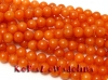 KA1013 Pomarańczowy jadeit kulka 8mm 3szt